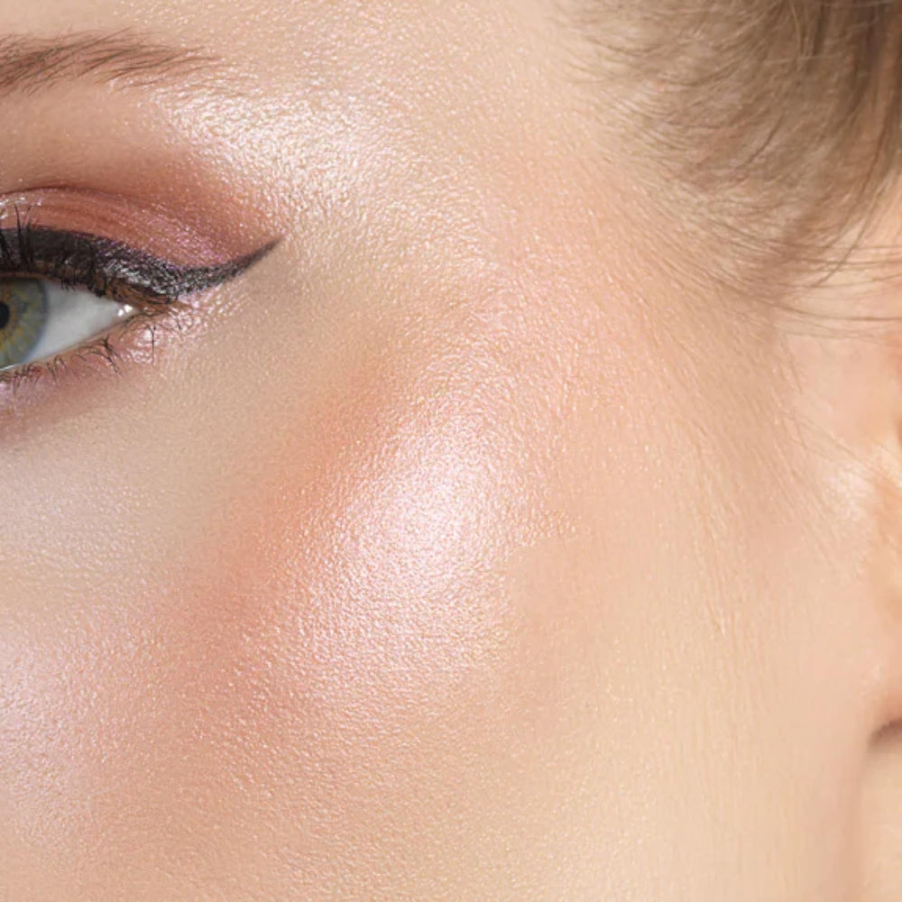 Brighten the nose bridge and Cupid's bow with subtle glow.