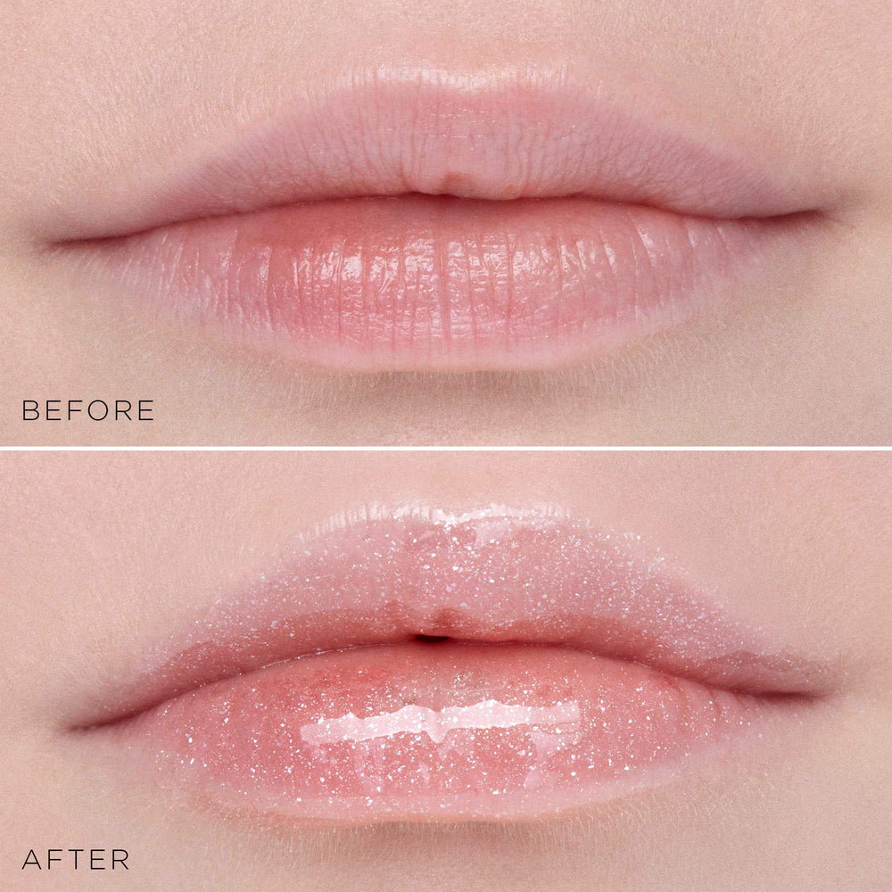 Lip-gloss application shot showing smooth, defined pout.