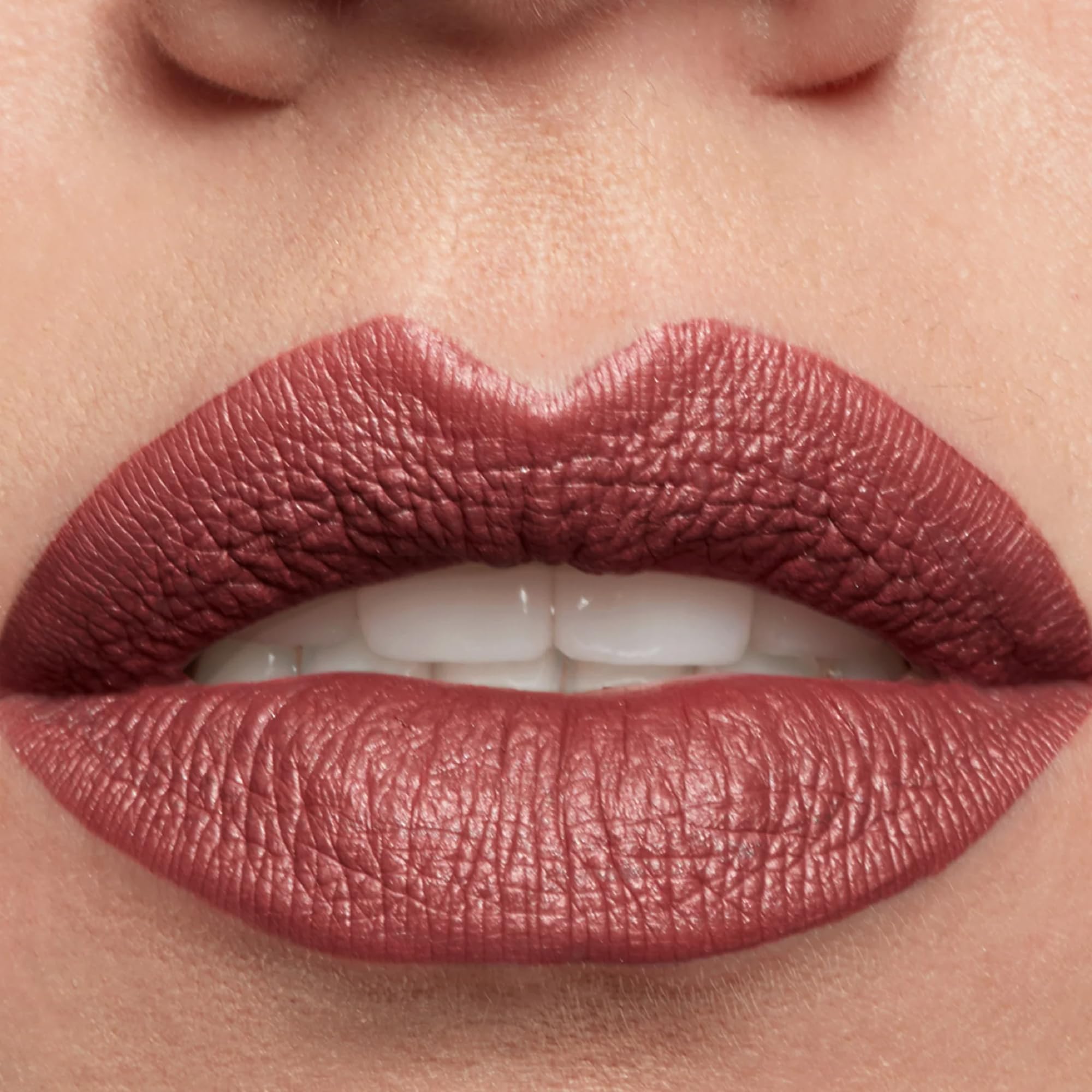 Stila Stay All Day Shimmer Lipstick on lips delivers color-rich, comfortable wear