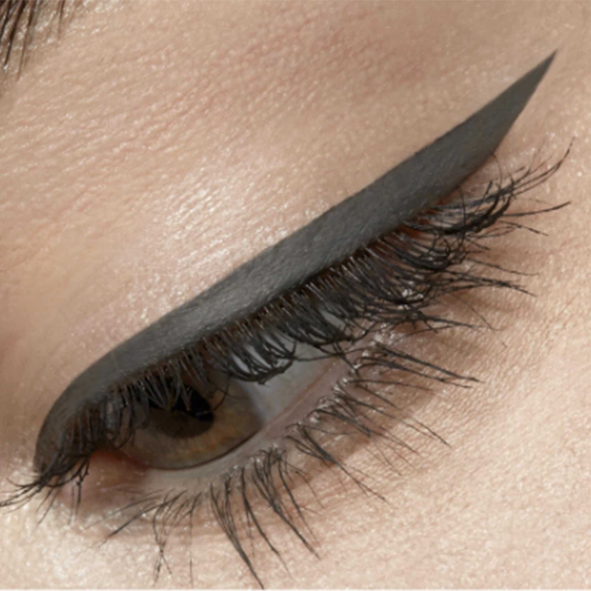 Stila Waterproof Liquid Eye Liner feathering strokes along lashes.