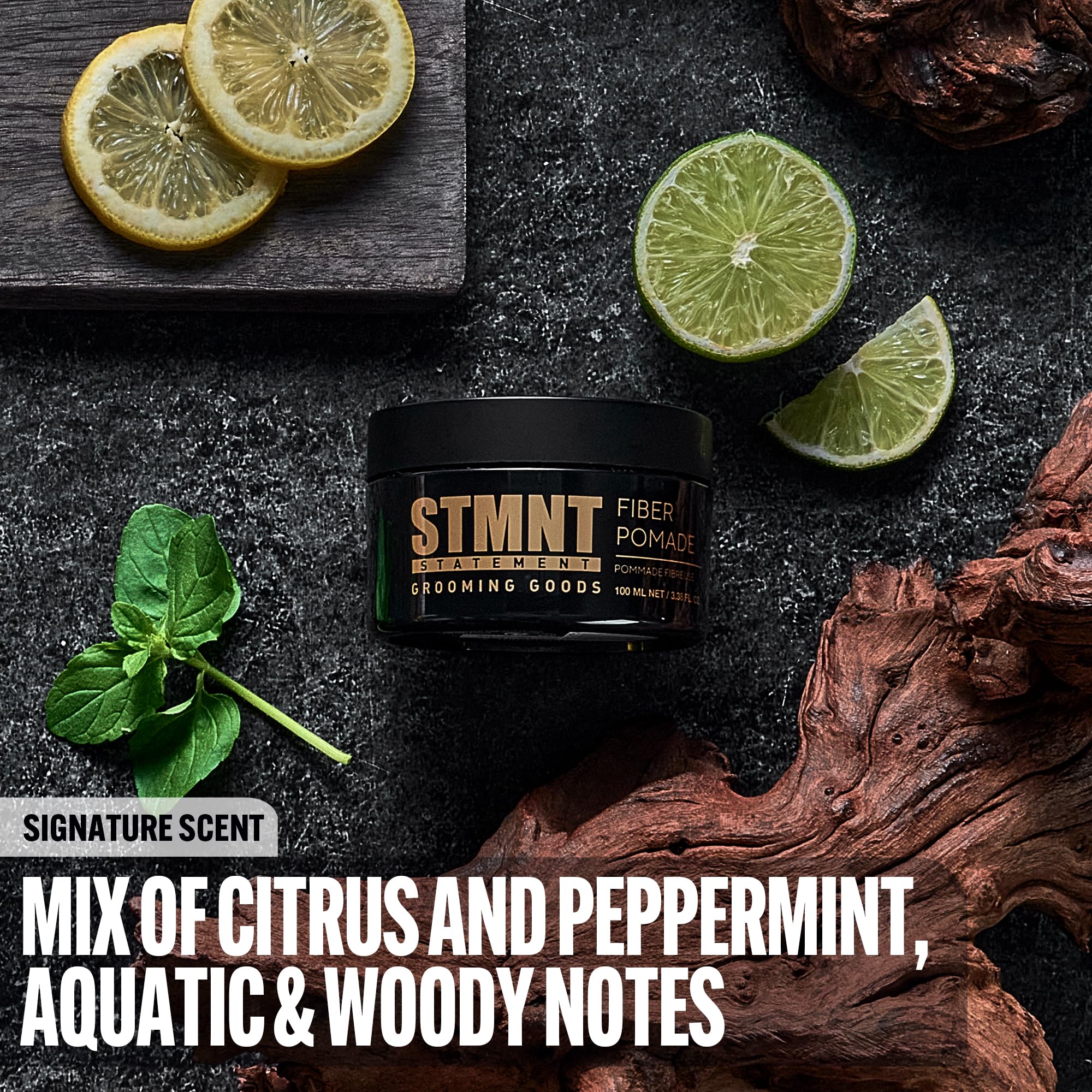 STMNT Fiber Pomade on palm shows pliable texture for separation and remoldable style.