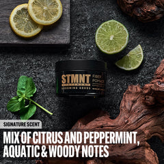 STMNT Fiber Pomade on palm shows pliable texture for separation and remoldable style.
