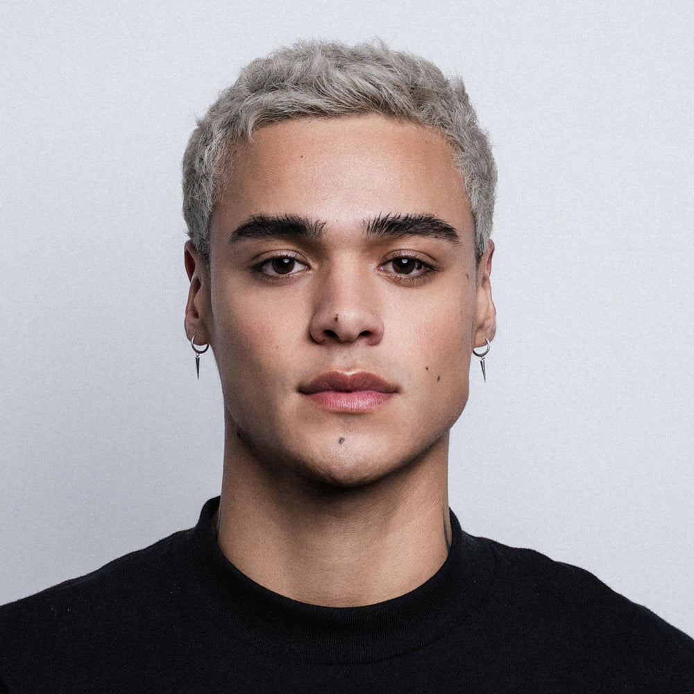Hair styled with STMNT shows semi-matte finish and clear separation.