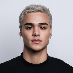 Hair styled with STMNT shows semi-matte finish and clear separation.