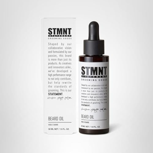 Daily-use STMNT beard oil smoothing rough beard hairs.