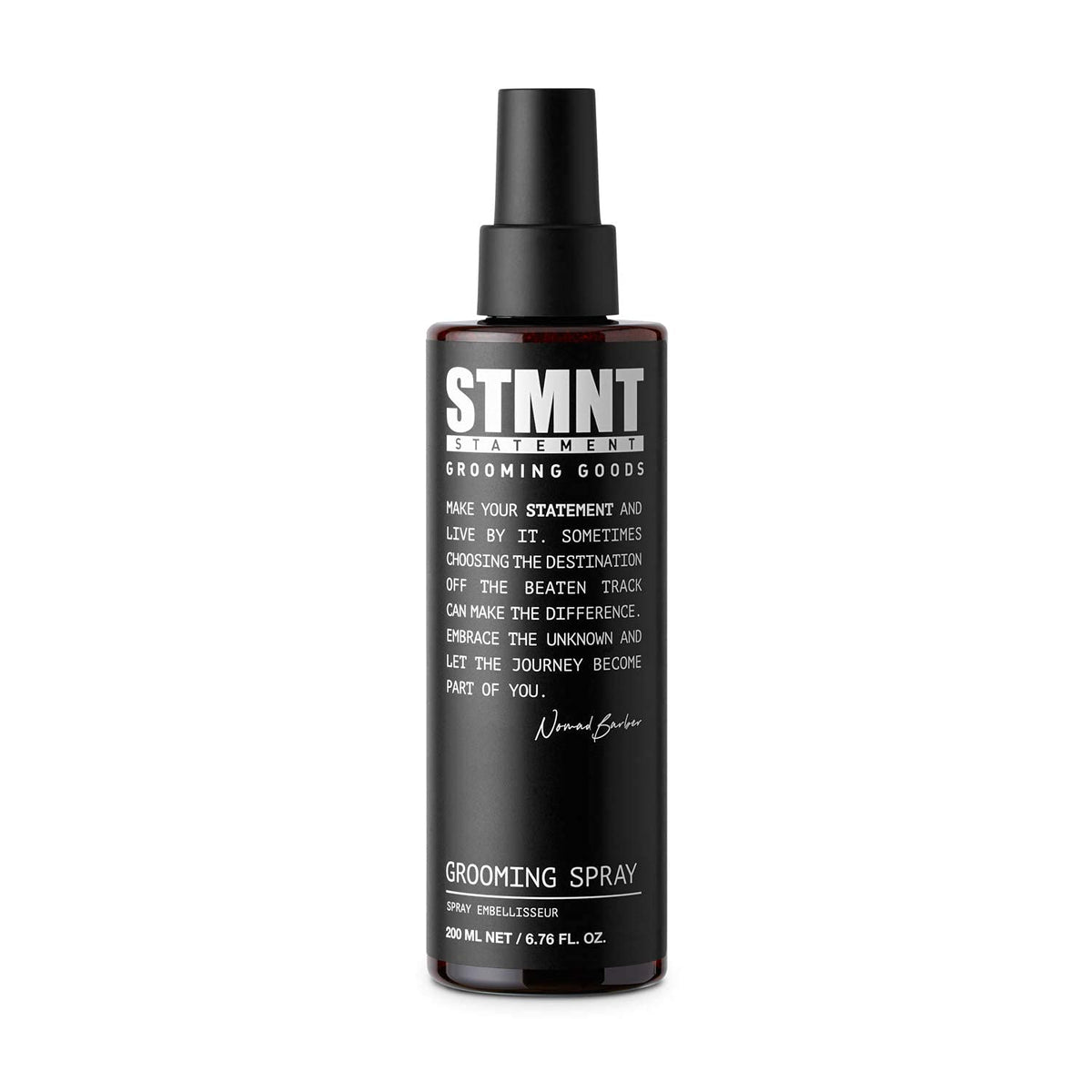 STMNT Grooming Spray in a 6.7 oz bottle for easy styling and light hold.