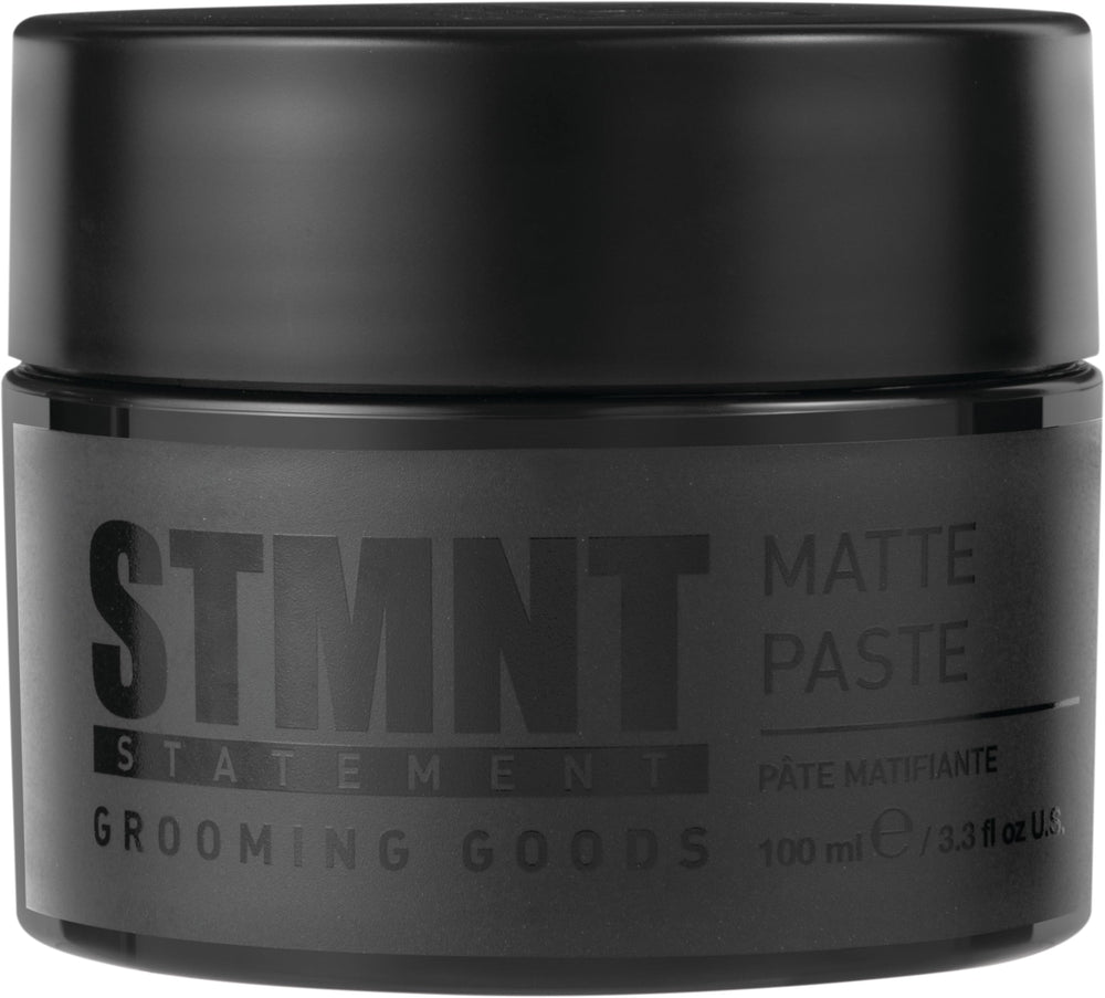STMNT Matte Paste jar close-up showing matte finish and texture.