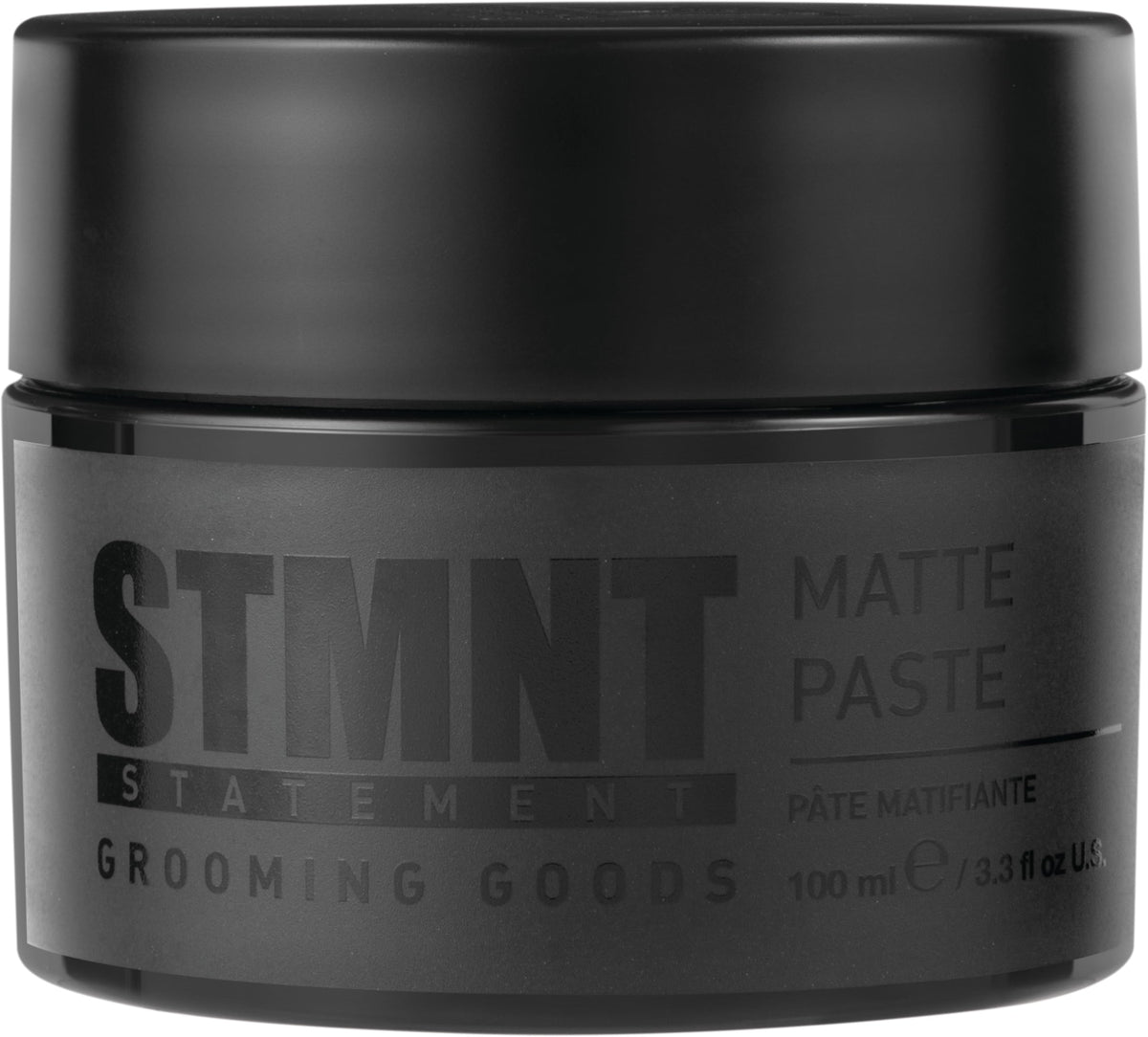 STMNT Matte Paste jar close-up showing matte finish and texture.