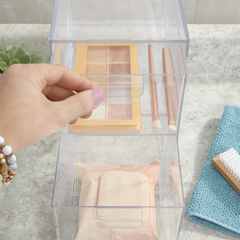 STORi Audrey transparent bins helping find jewelry and makeup quickly.