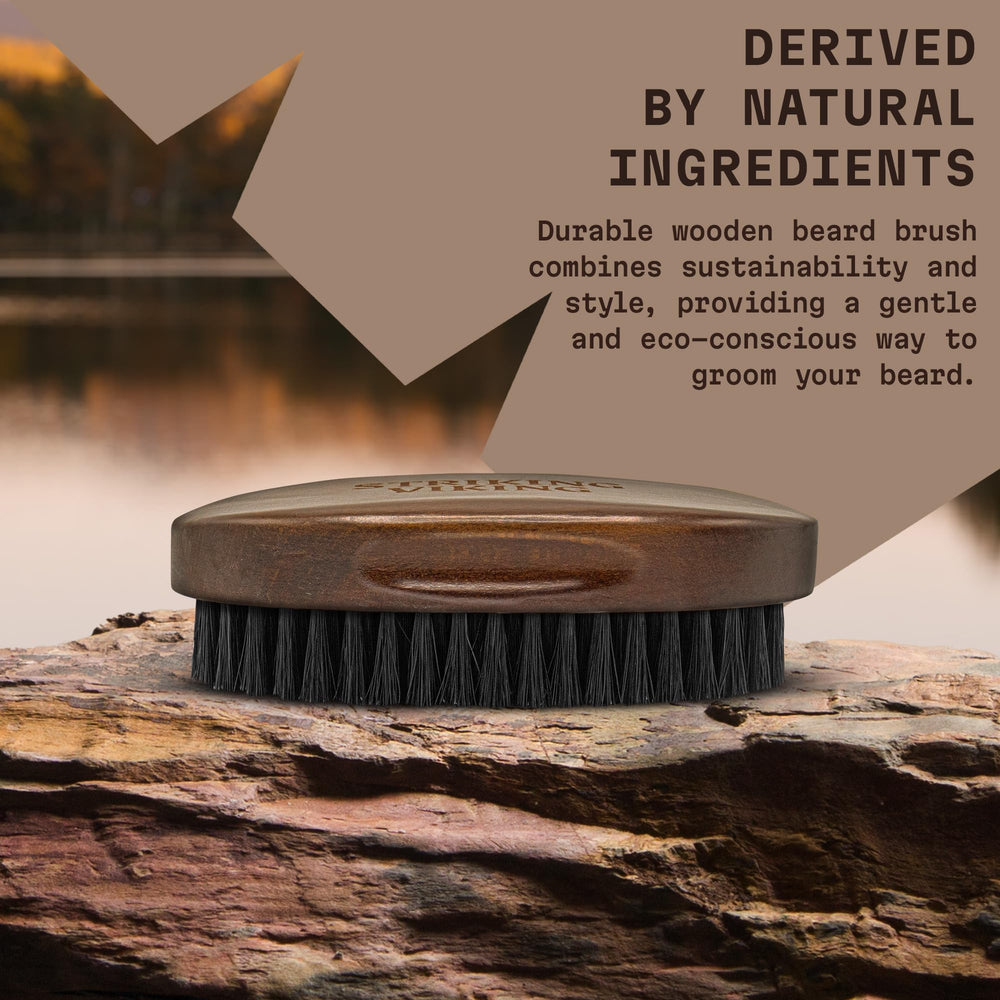 Striking Viking beard brush in travel case, ready for on-the-go grooming.