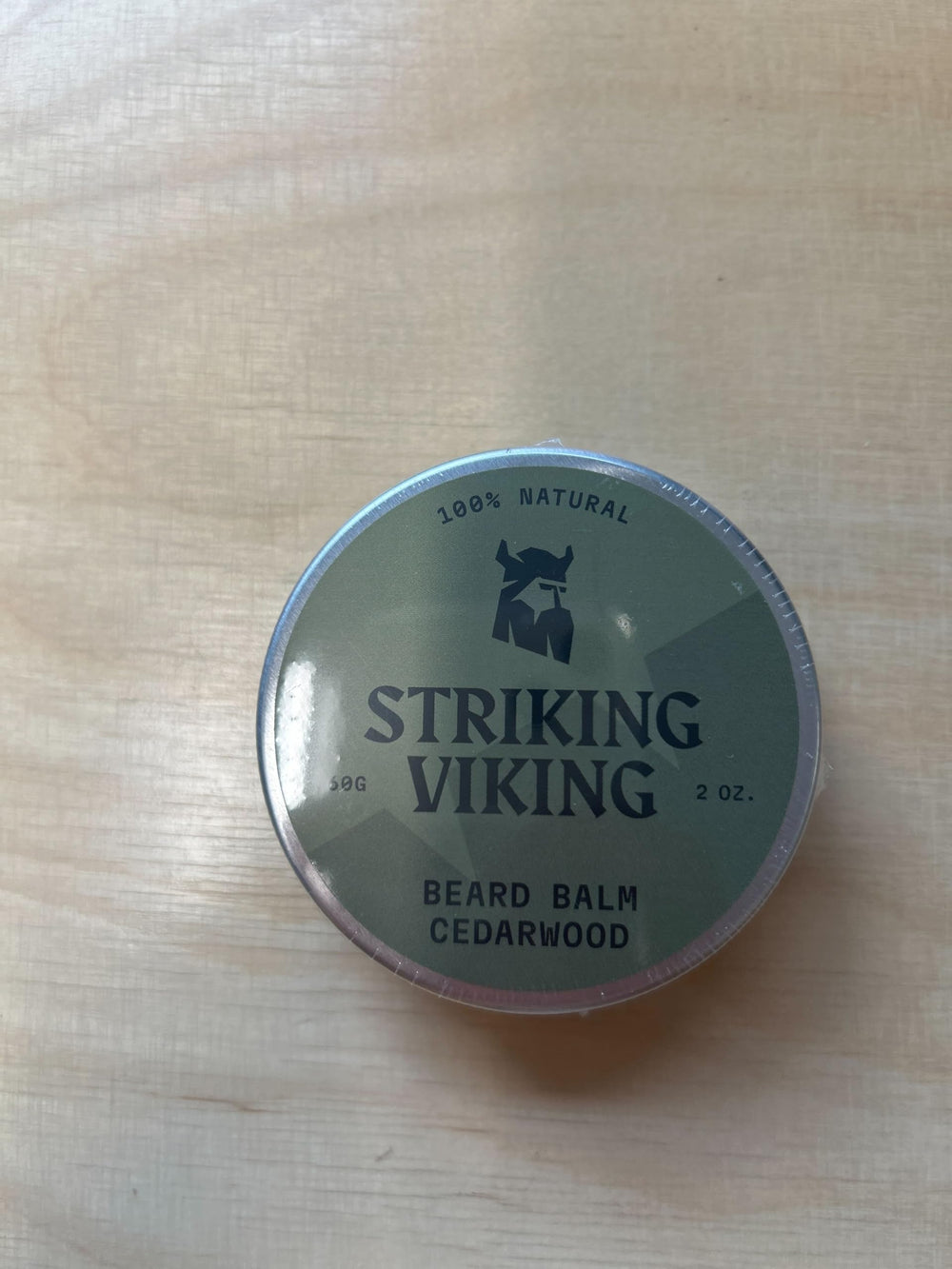 Product in natural light highlighting cedar fragrance and texture.