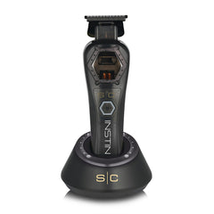 Stylecraft Instinct Metal Edition trimmer front view with ergonomic grip for comfortable styling.