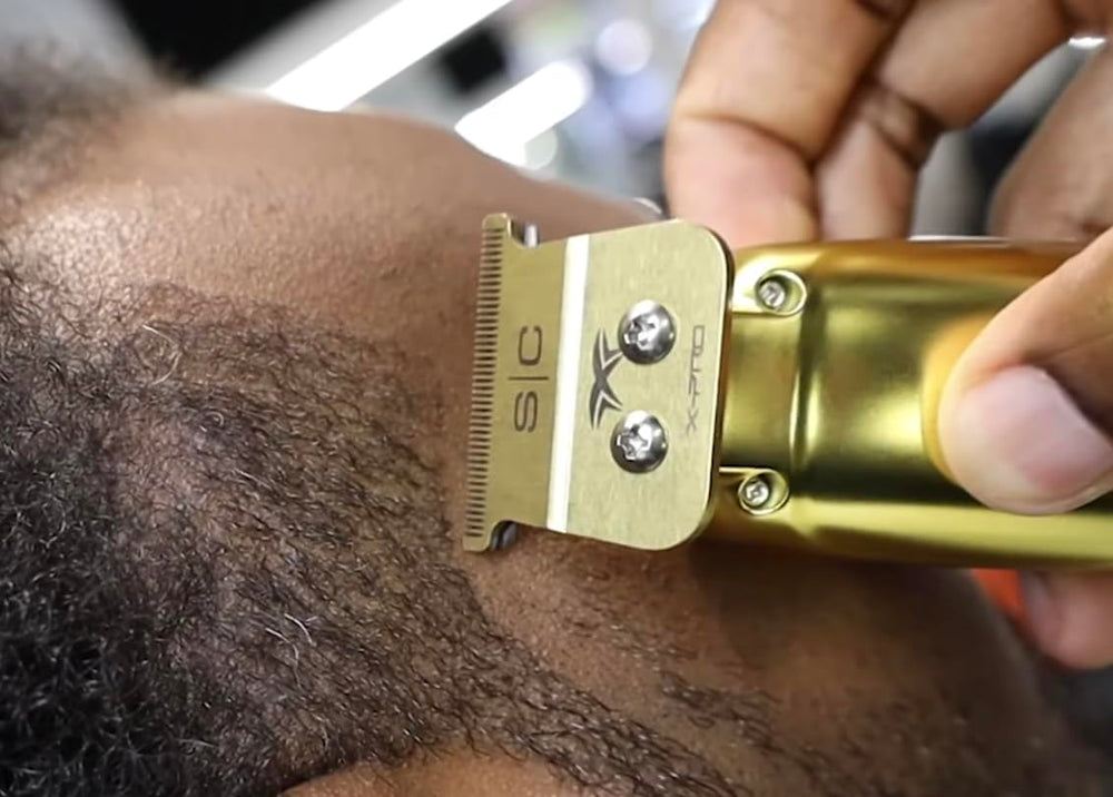 Stylecraft Saber professional in use in a barbershop for smooth grooming tasks.