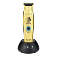 Stylecraft Saber professional cordless trimmer with gold full-metal body offers premium control for precise grooming.