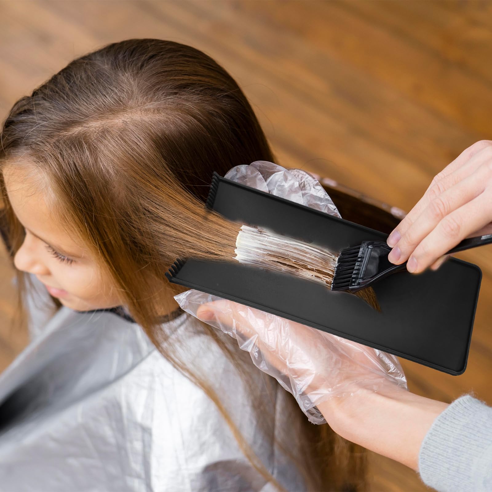 Styquenzer foiling board for highlights helps smooth color application.