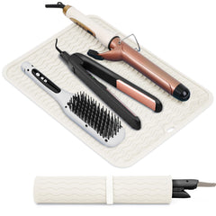 Suafrnut oversize silicone mat on vanity protecting surfaces while styling multiple tools.