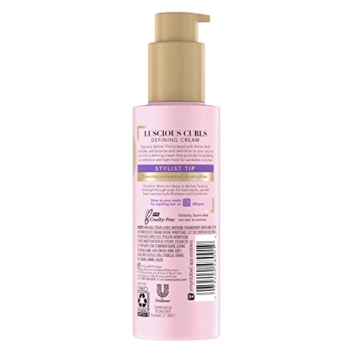 Suave Crema Definición Rizos: aplicación en manos para rizos manejables.