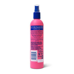 Suave Kids Detangler Bottle closeup showing easy dispense action.
