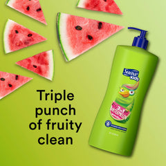 Happy kid enjoying bath with Suave Kids Wacky Melon 3-in-1