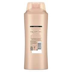 Close-up of conditioner pump-action showing easy application and detangling potential.