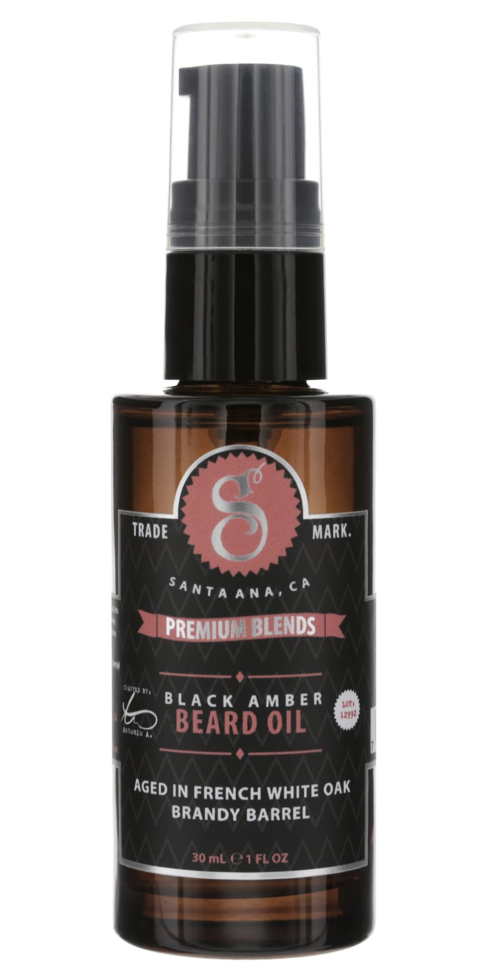 Suavecito Premium Blends beard oil bottle with pump for easy application and skin hydration.