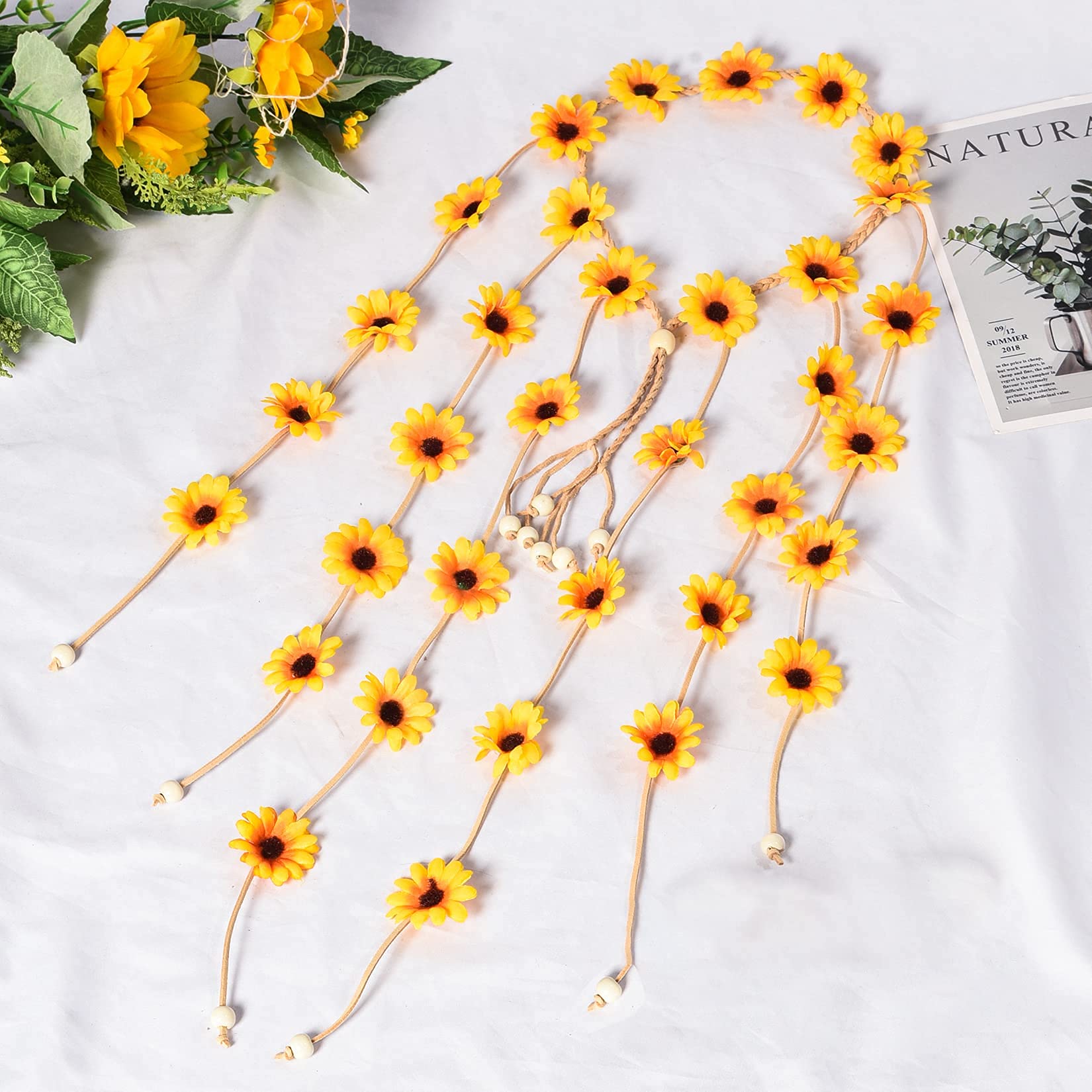 Diadema floral con nudo ajustable de Sucrain, se adapta a diferentes cabezas.