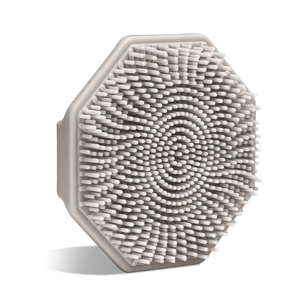 Sud Scrub antimicrobial silicone face scrubber showing antimicrobial surface and texture.