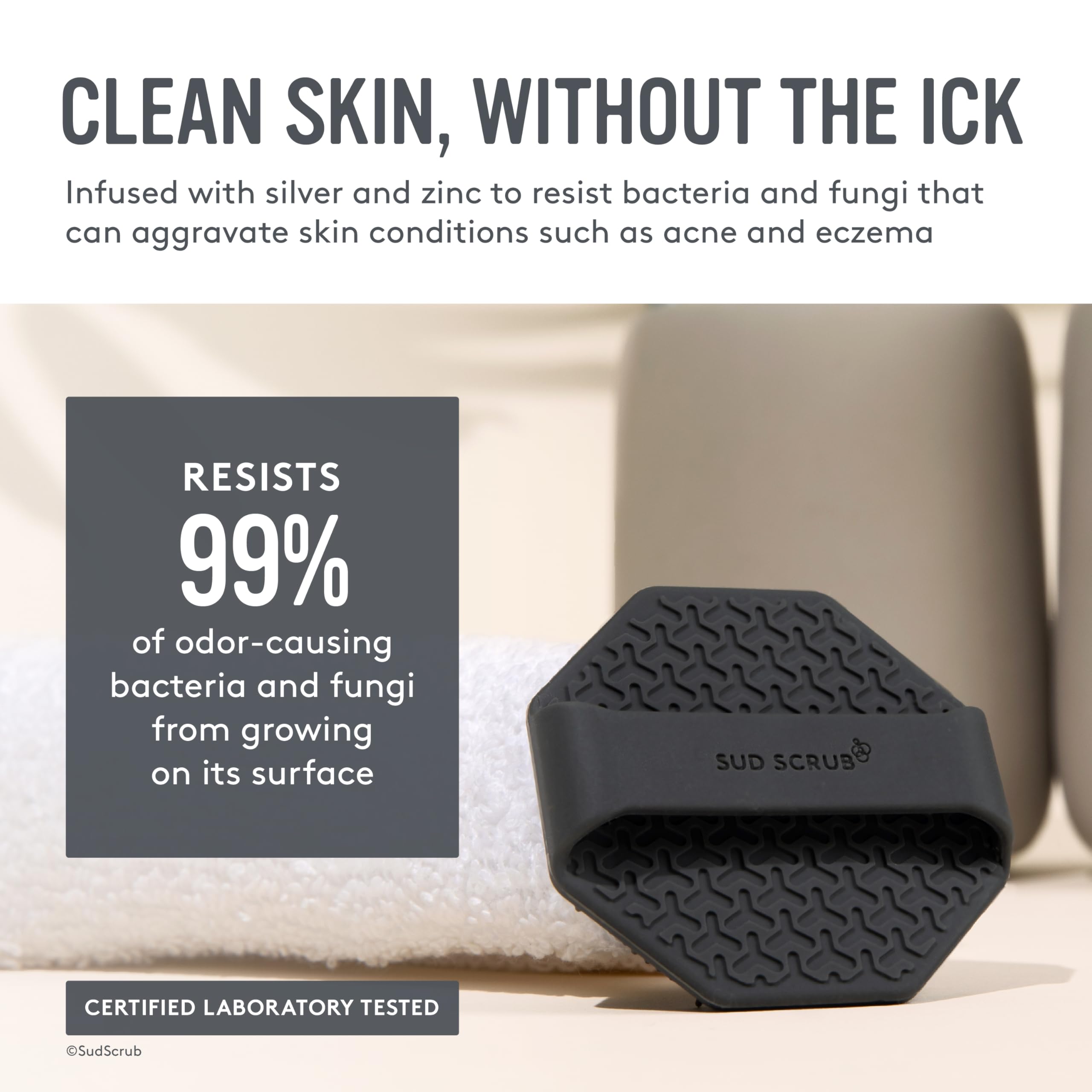 Sud Scrub hand-held charcoal face scrubber demonstrates non-slip grip for confident cleansing.