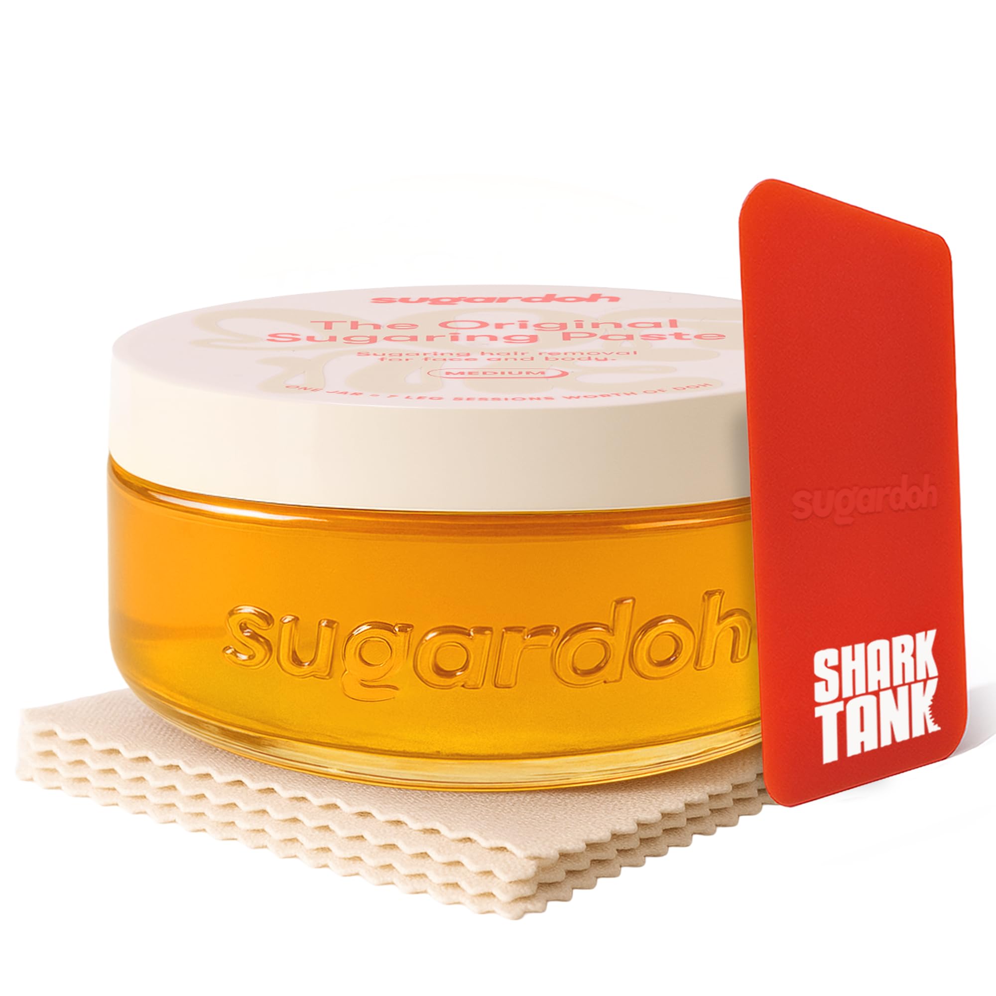 Sugardoh sugaring kit vintage jar close-up for at-home waxing.