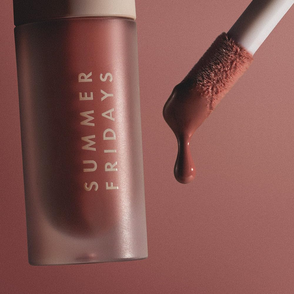 Summer Fridays Dream Lip Oil layered over lipstick for added dimension.