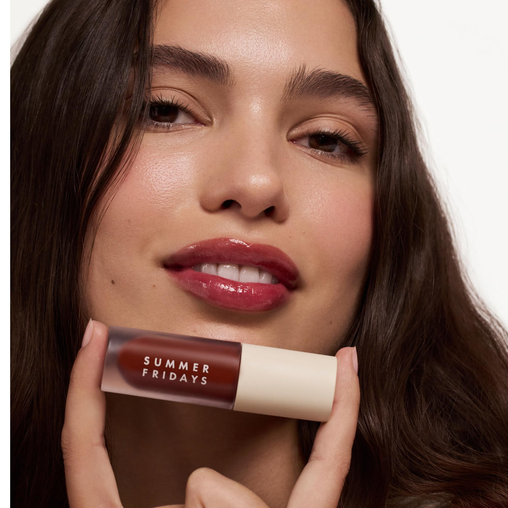 Midnight Berry swatch on lips shows vibrant color and lasting hydration.