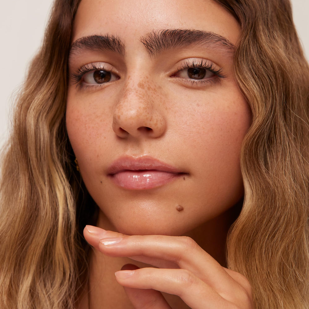 Vanilla scent on lip butter balm close-up enhances pampering feel