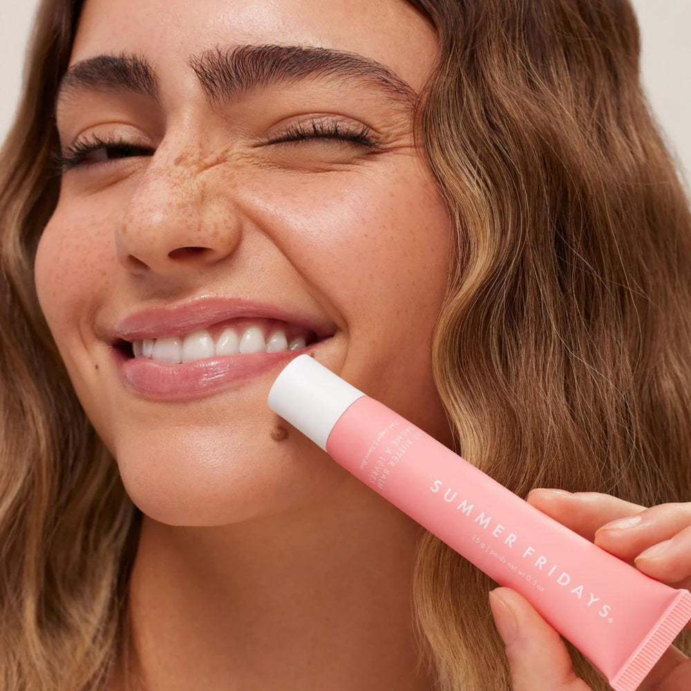 Soft pink tint swirls on lips for natural everyday glow.