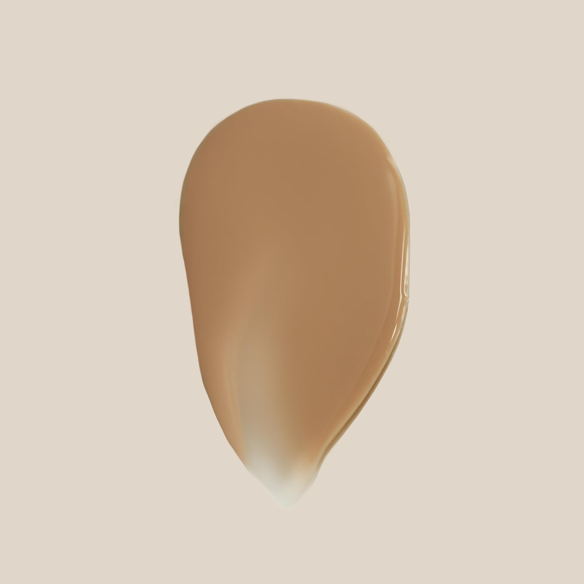 Summer Fridays Sheer Skin Tint pump close-up highlights easy, even application.