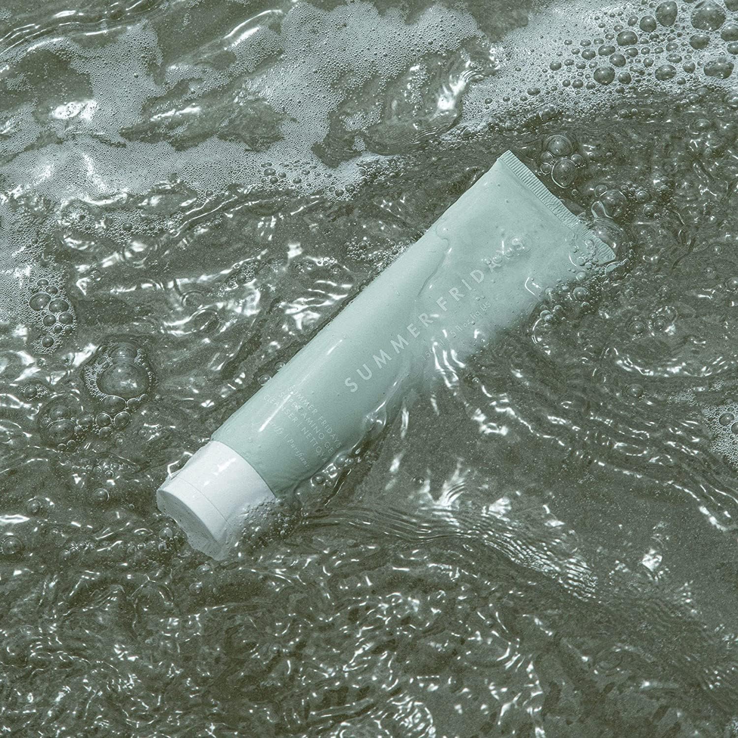 Summer Fridays Super Amino Gel Cleanser maris sal mineral infusion calms irritation on skin.