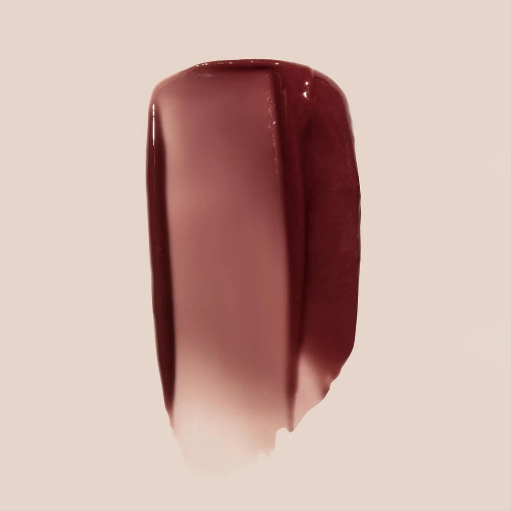Summer Fridays Tinted Lip Butter Balm applied on lips delivers instant moisture.