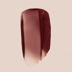 Summer Fridays Tinted Lip Butter Balm applied on lips delivers instant moisture.