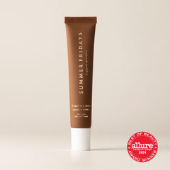 Summer Fridays Lip Butter Hot Cocoa being applied on lips for moisture