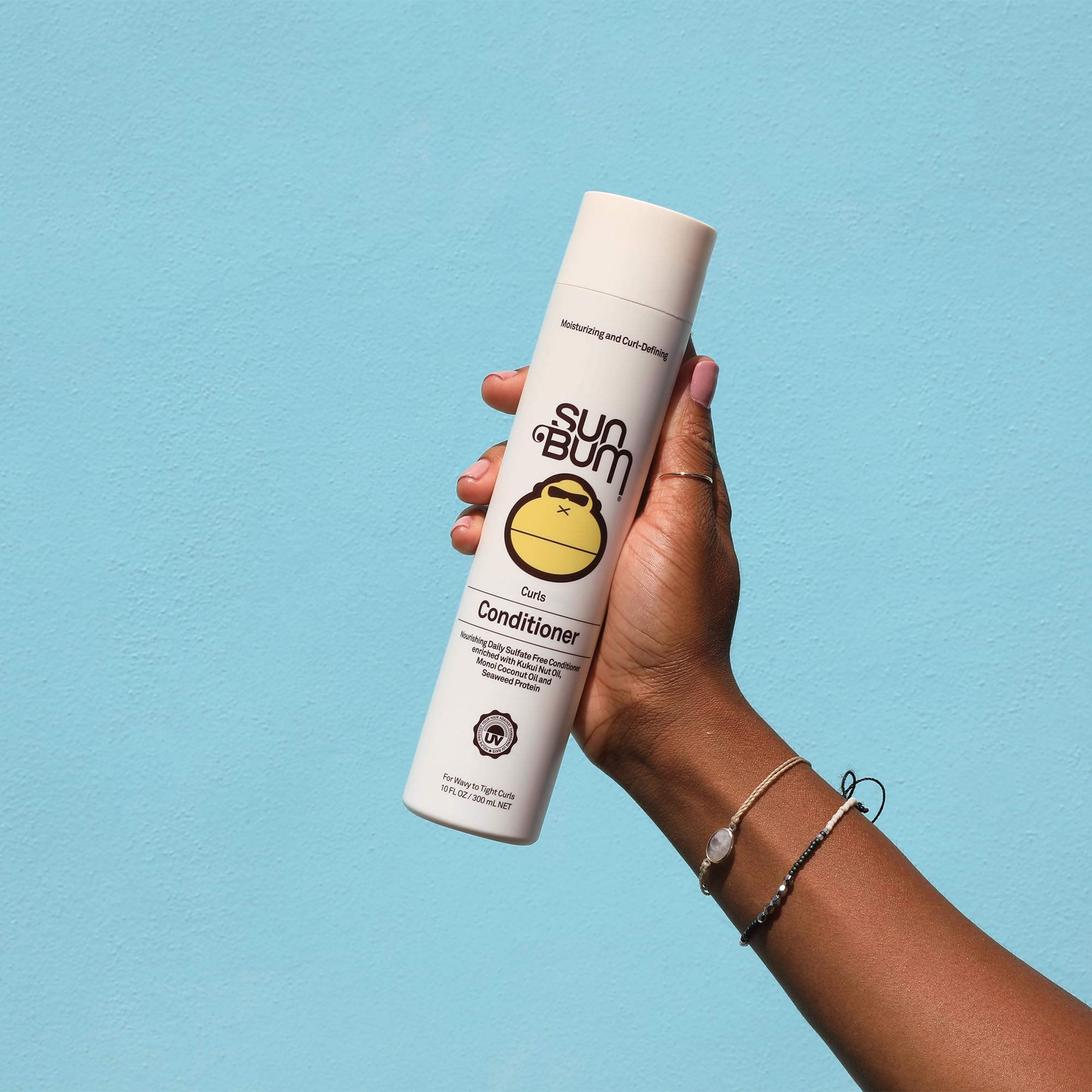 Sun Bum Curls Acondicionador, aplicación suave en rizos para brillo natural.