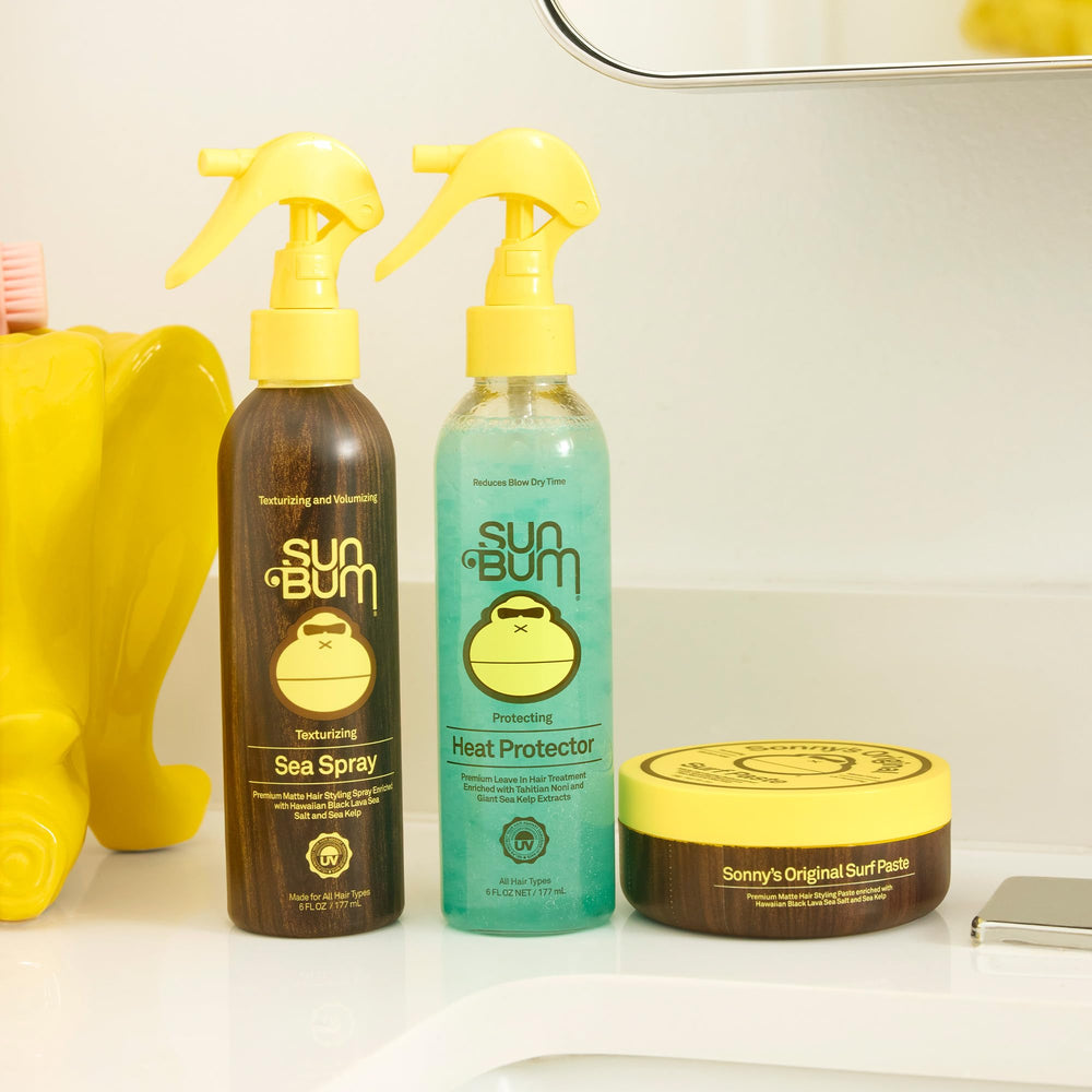 Sun Bum Heat Protector Spray con fórmula de dos fases para nutrición ligera.