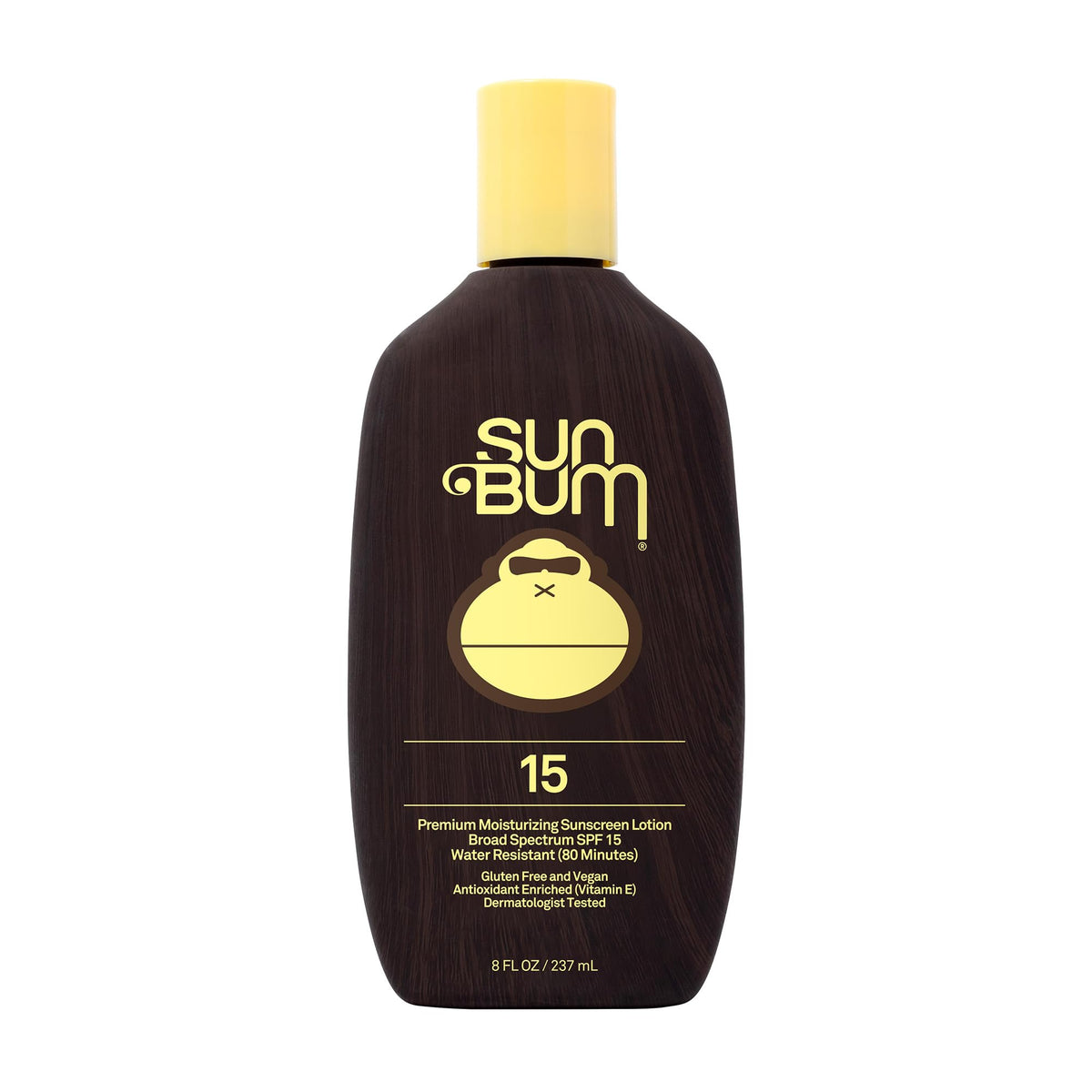 Sun Bum Original SPF 15 lotion bottle on a sunny beach, protecting skin daily