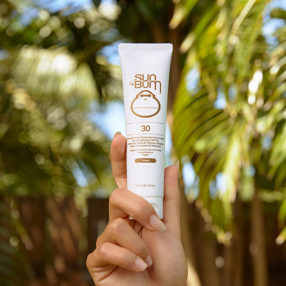 Sun Bum zinc-based mineral sunscreen application closeup highlights silky texture