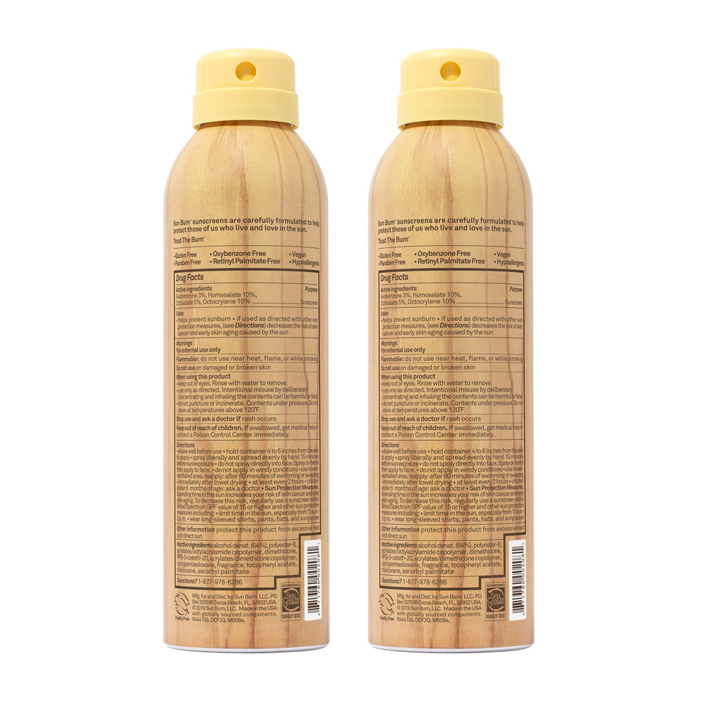Sun Bum Original SPF 70 spray on a sunny beach scene for outdoor fun