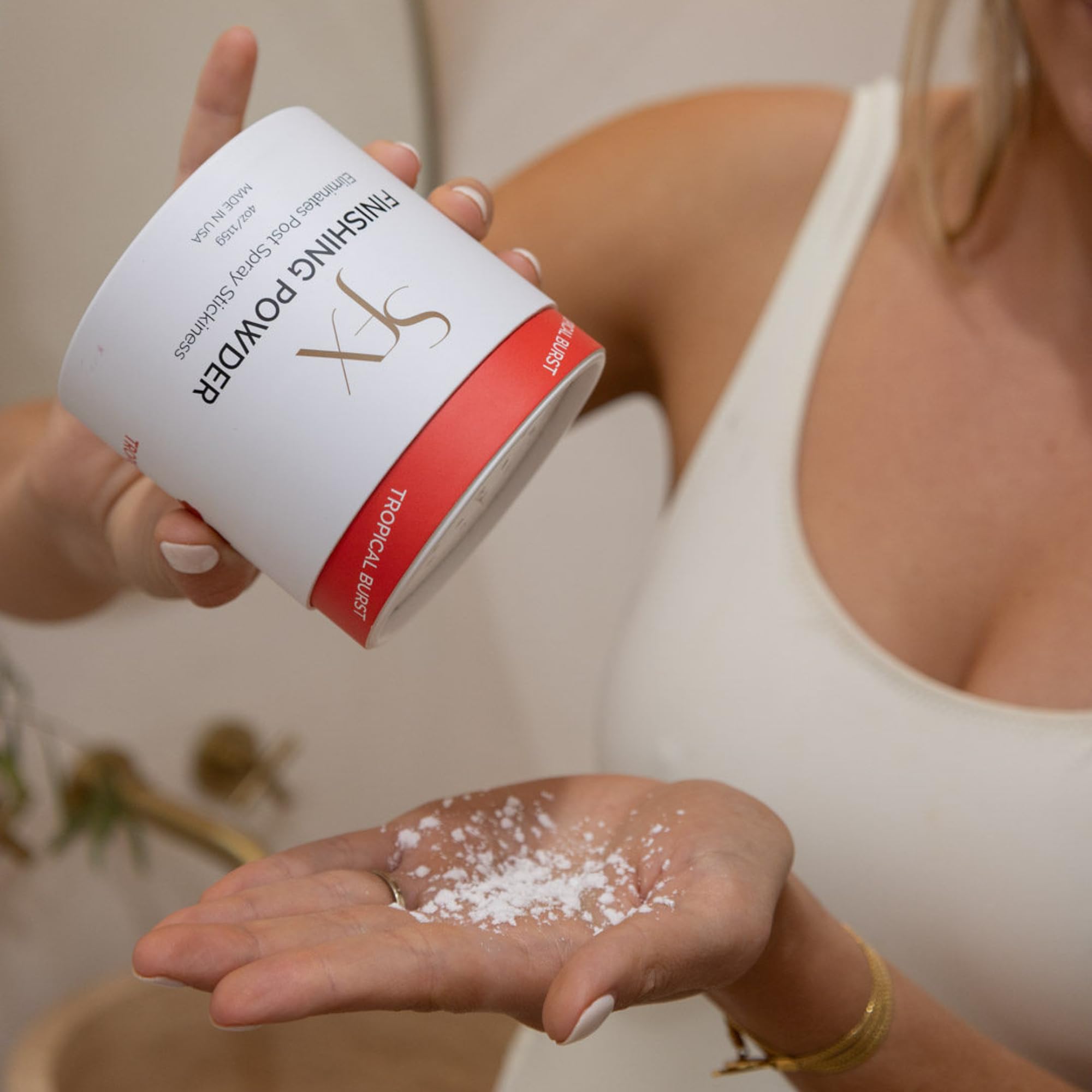 SunFX Post Spray Tan Finishing Powder tropical-burst powder-dusting on knees reduces stickiness.