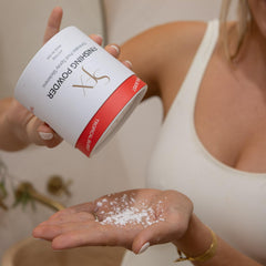SunFX Post Spray Tan Finishing Powder tropical-burst powder-dusting on knees reduces stickiness.