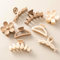 Sunolga clip pelo flor garra crema, sujeción elegante para peinados suaves.