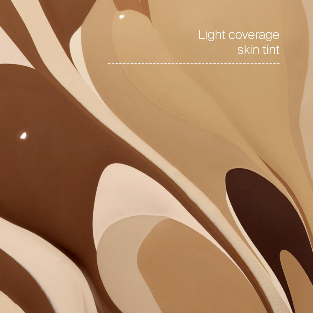 Protec(tint) blendable tint spread on skin showing a smooth, even finish.