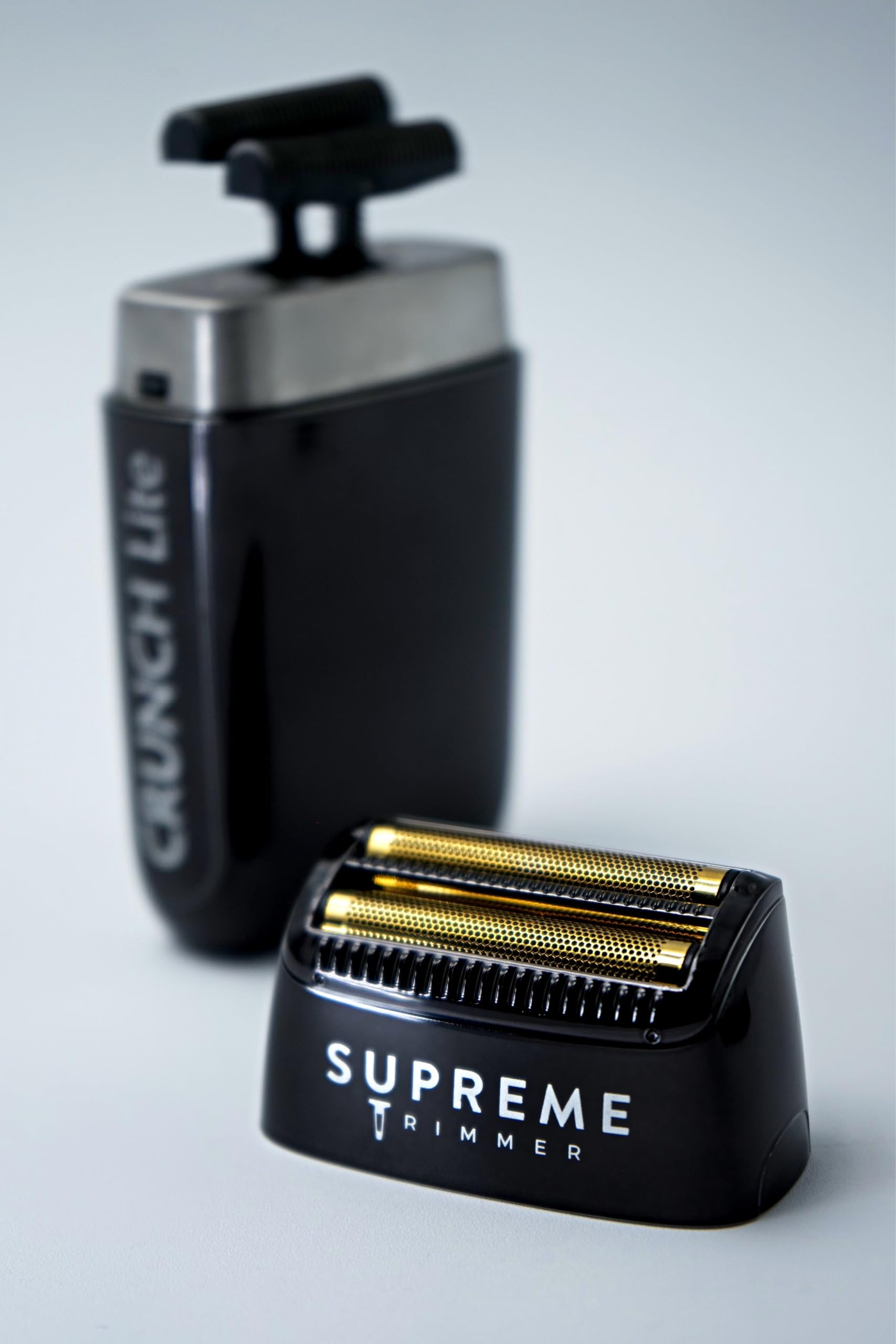 Lifestyle image of Supreme Trimmer SB55 beside sink showing clean shaving setup and comfort benefits
