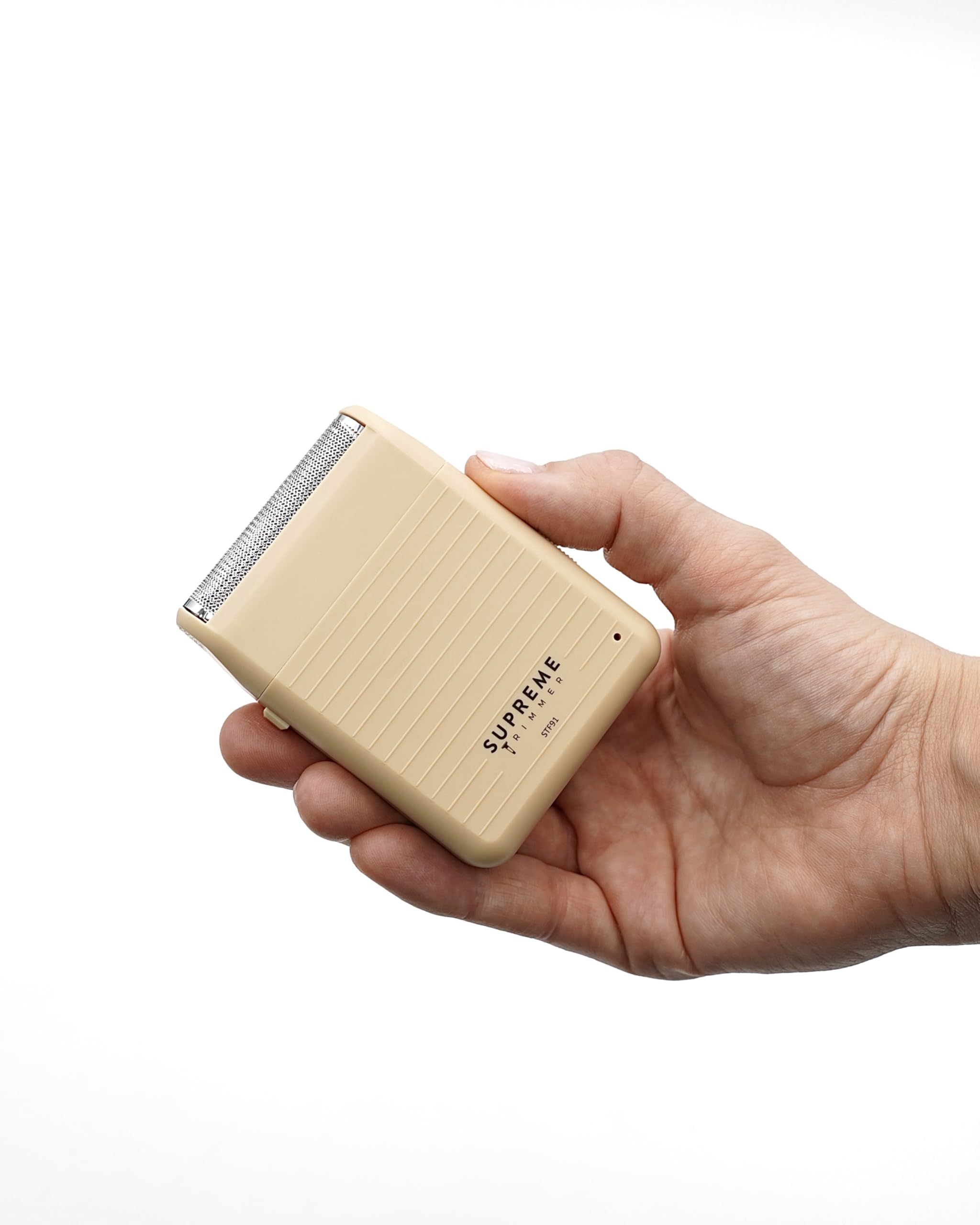 Supreme Trimmer Solo Lite packaging box highlights features and USB charging.