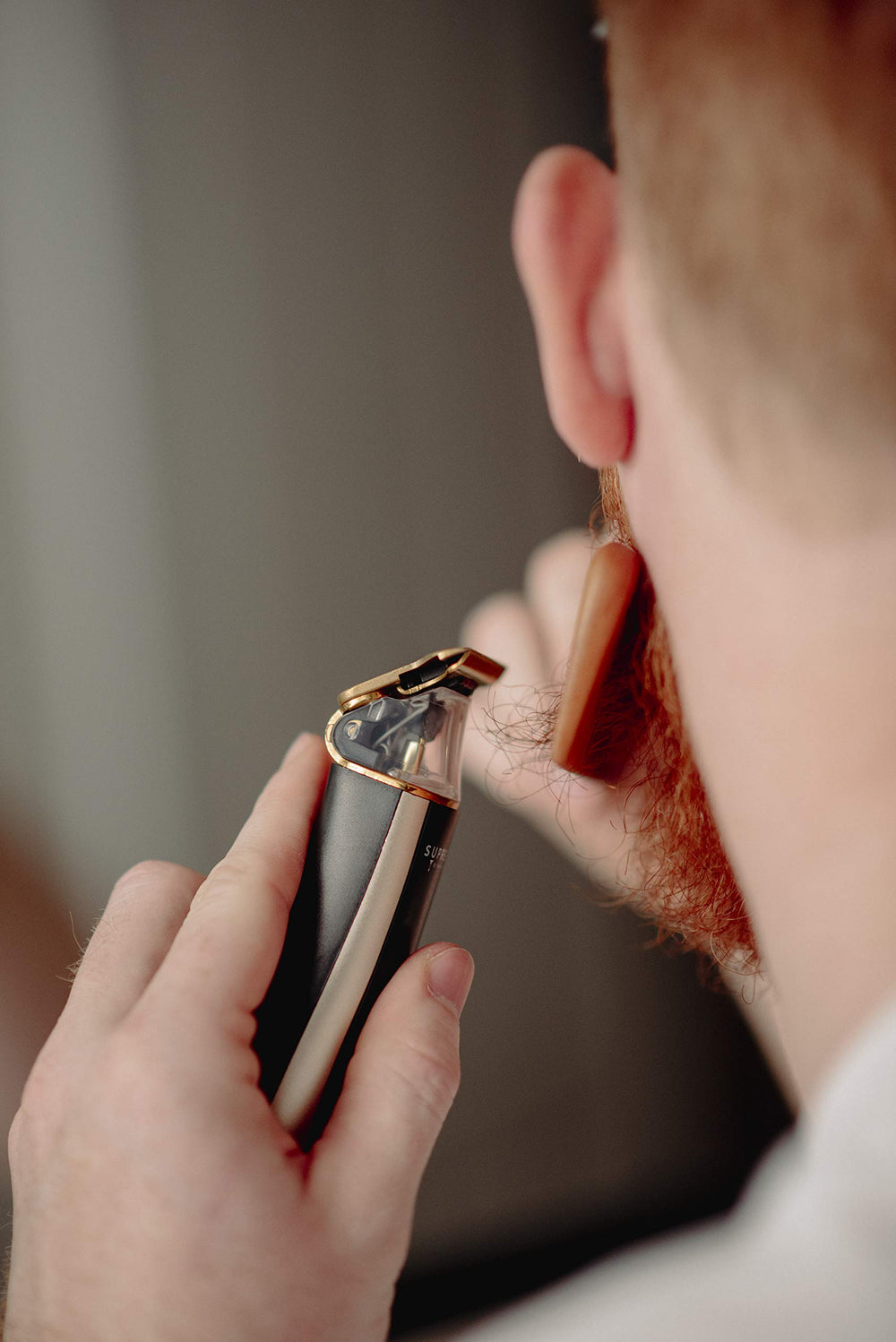 Supreme Trimmer T Shaper ergonomic grip emphasizes easy control during trims